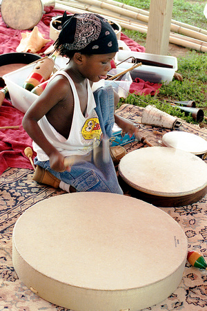 1070: Child Playing the Drums